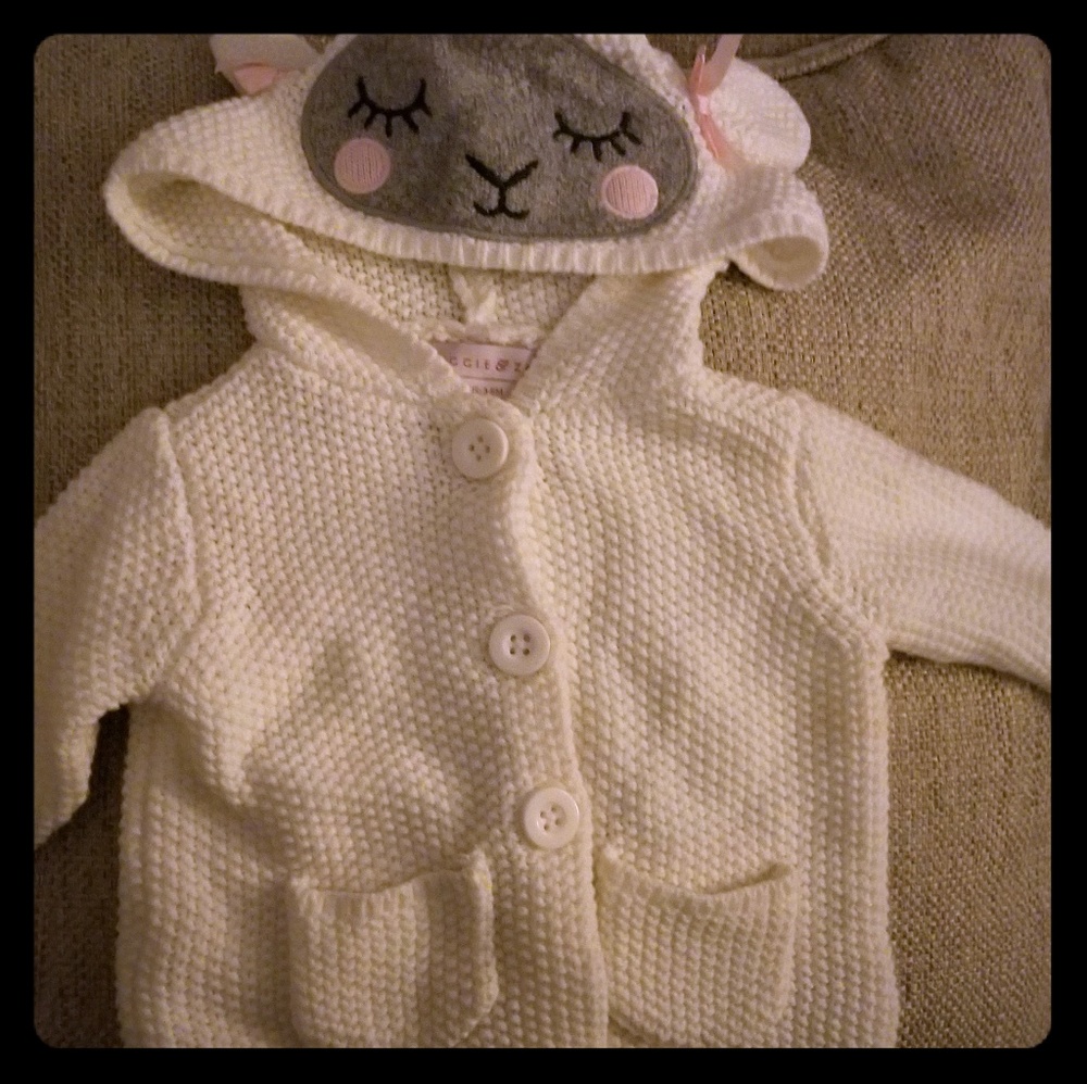 Knitted baby lamb sweater